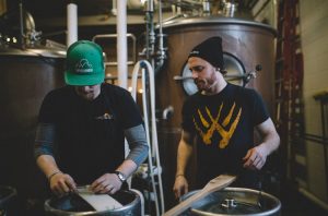 Dave Newsted and Marty Hueter brewing P.U.B. Lager at Wolverine State Brewing CO.