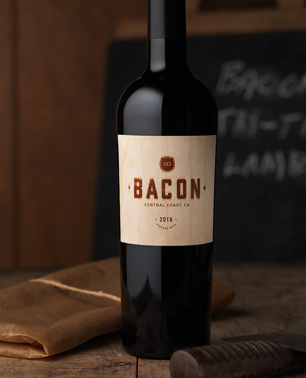 A bottle of Bacon wine by Guarachi Wine Partners. The label looks like a butcher's block.