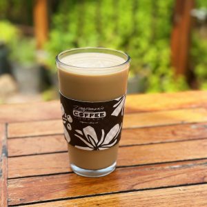 A pint glass of Rhode Island coffee milk