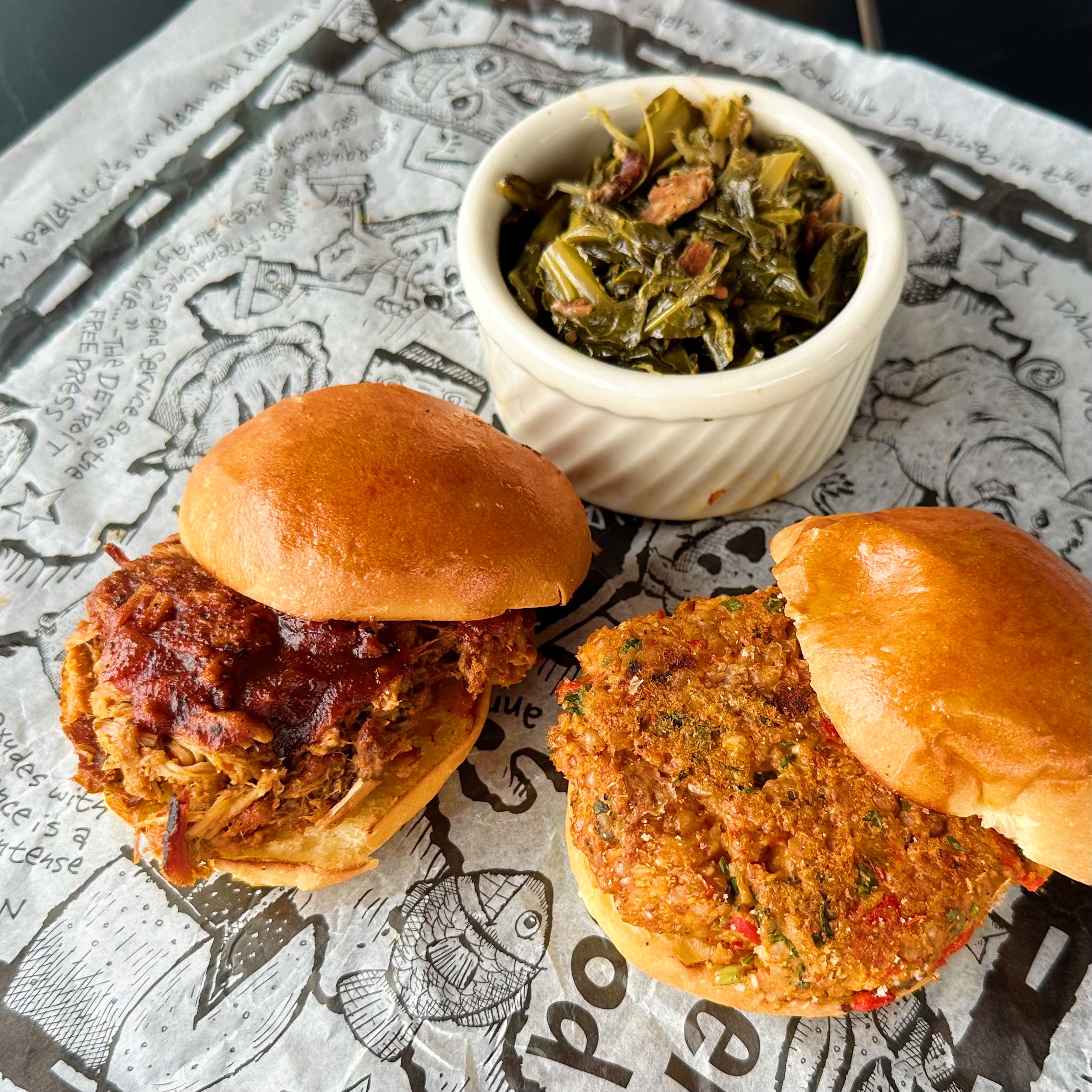 Two sliders and a side of collard greens
